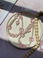 آویز مروارید و پاپیون صورتی (کدa0260)